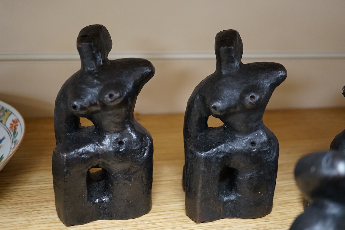 Three pairs of small black figural abstract sculptures, together with two similar sculptures. (8). Tallest 15cm high